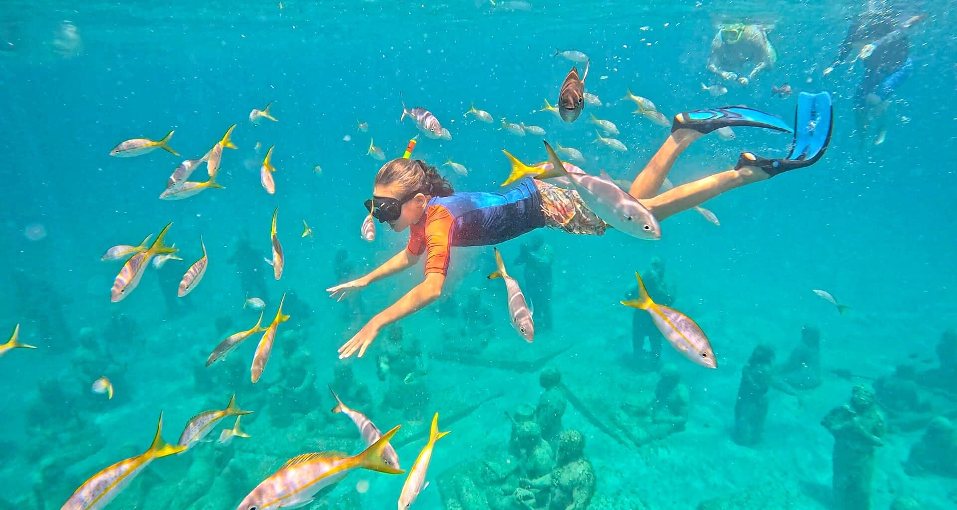 Taino child with fish