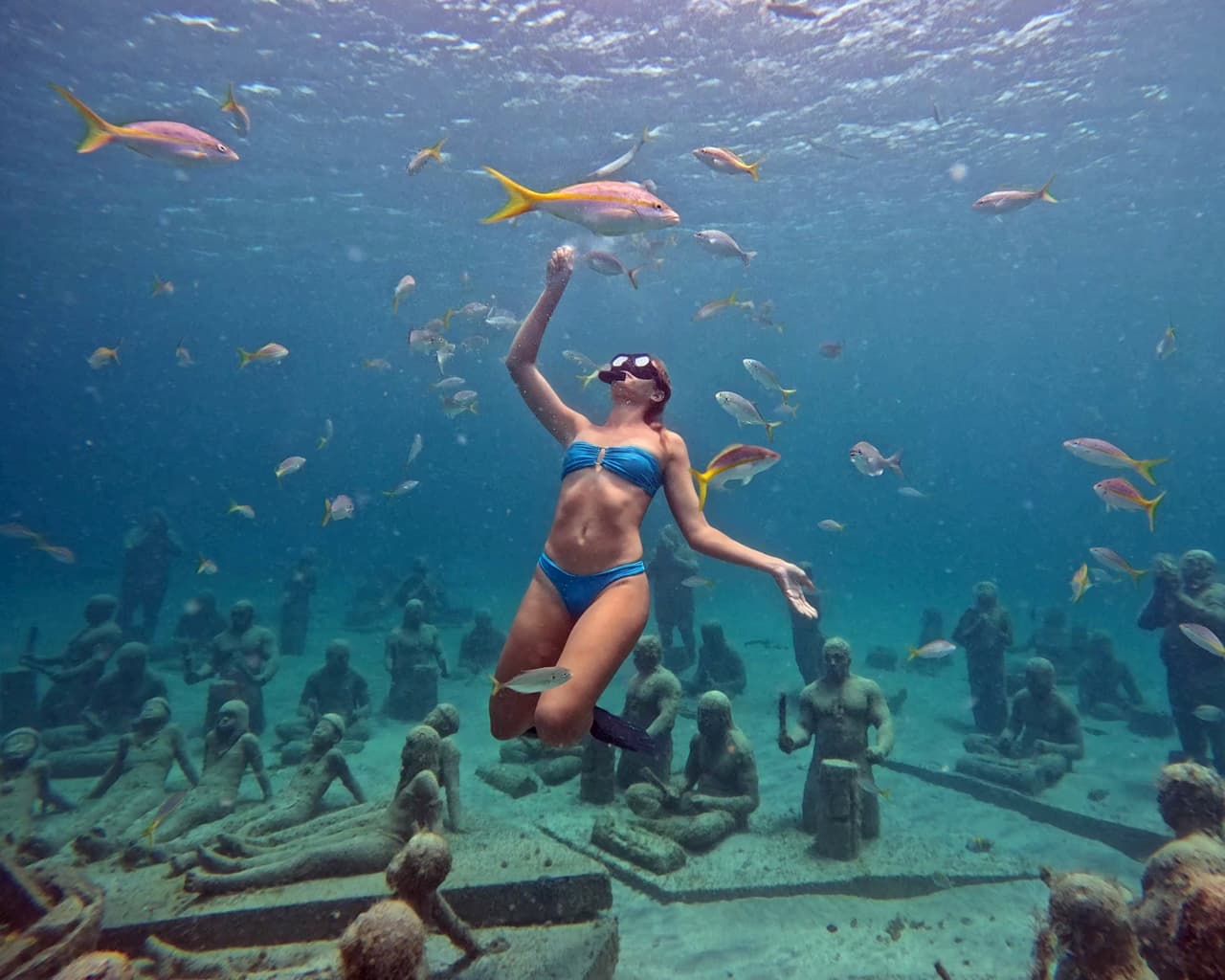 Girl under fish